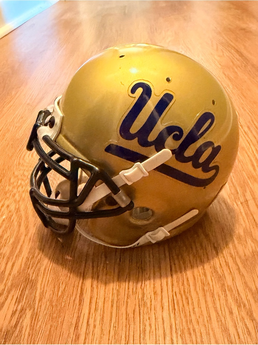 UCLA mini Gold Football Helmet with Blue Script SCHUTT